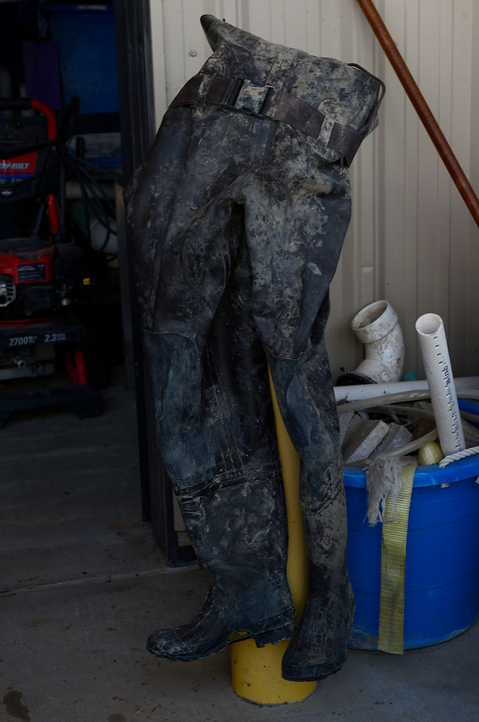 A pair of waders sit outside Lincoln University's Aquaculture facility